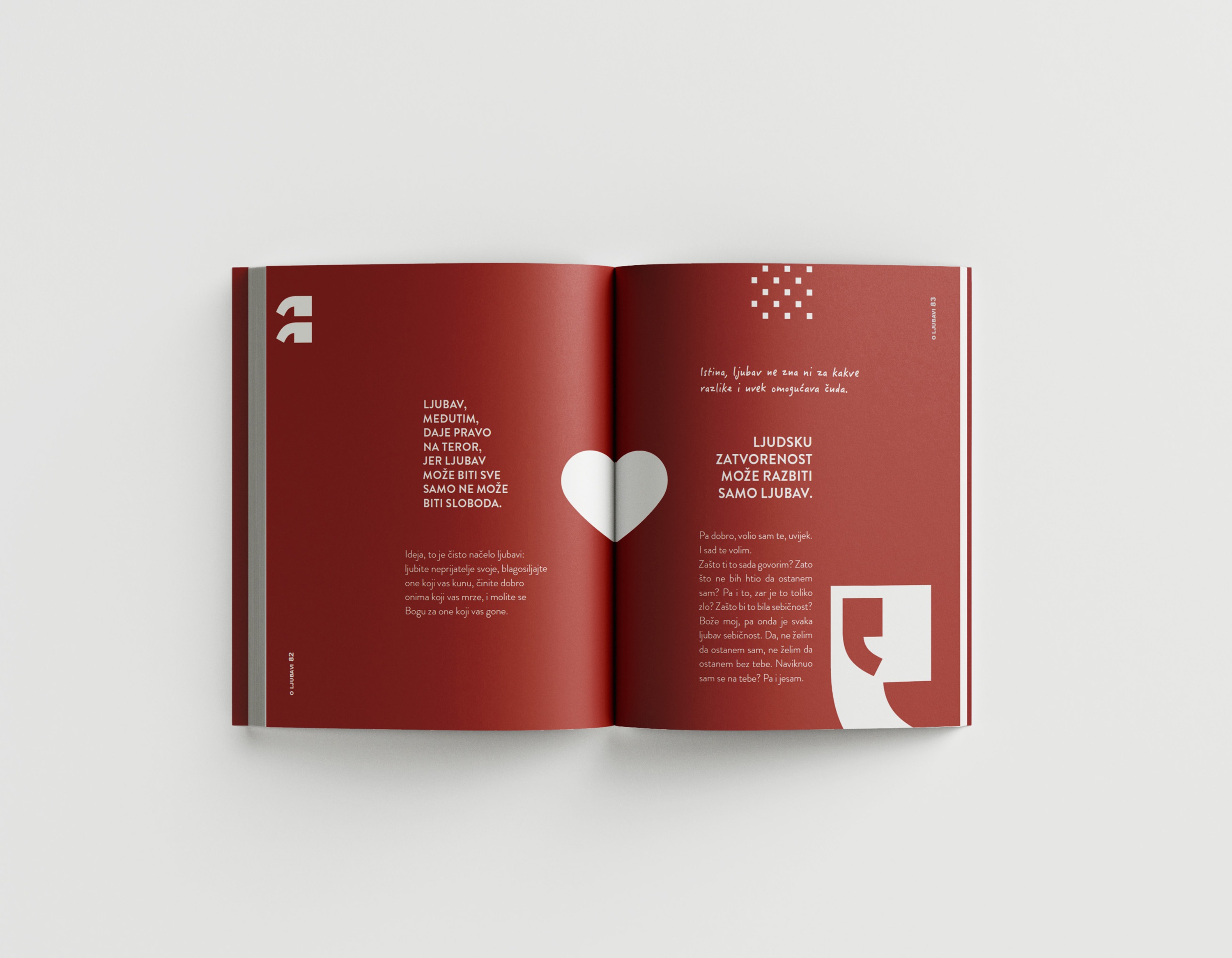 Interior spread with heart motif spanning the gutter on deep red background
