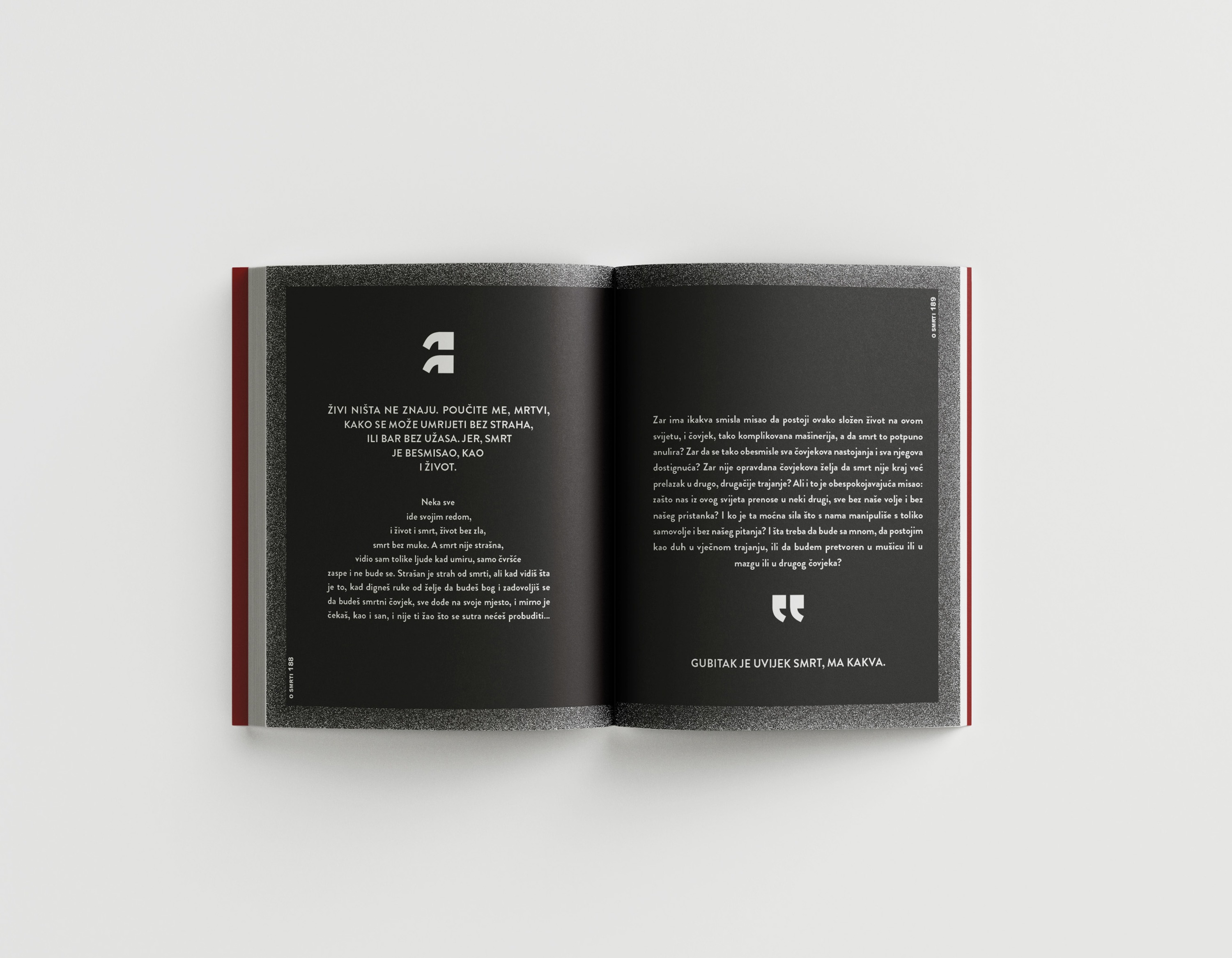Interior spread with white-on-black typography and large quotation mark icons