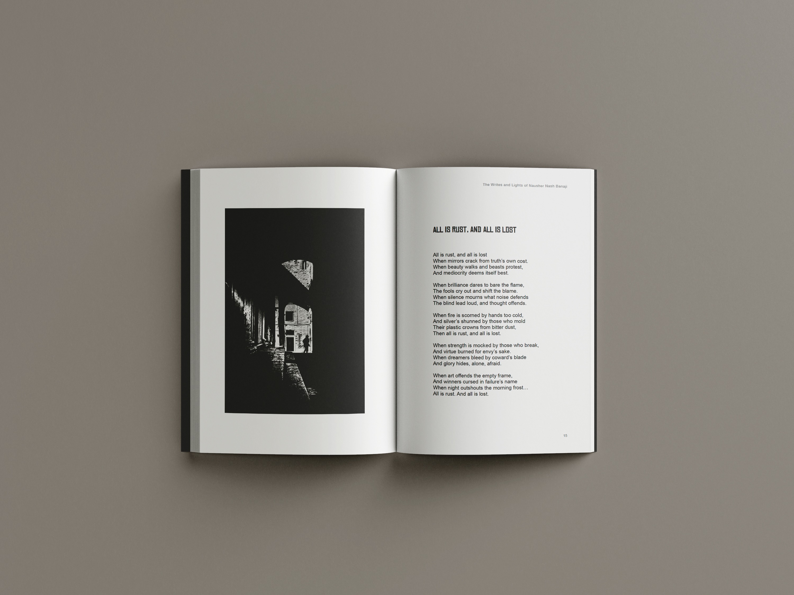 Interior spread with dark alley photograph and poem on white page