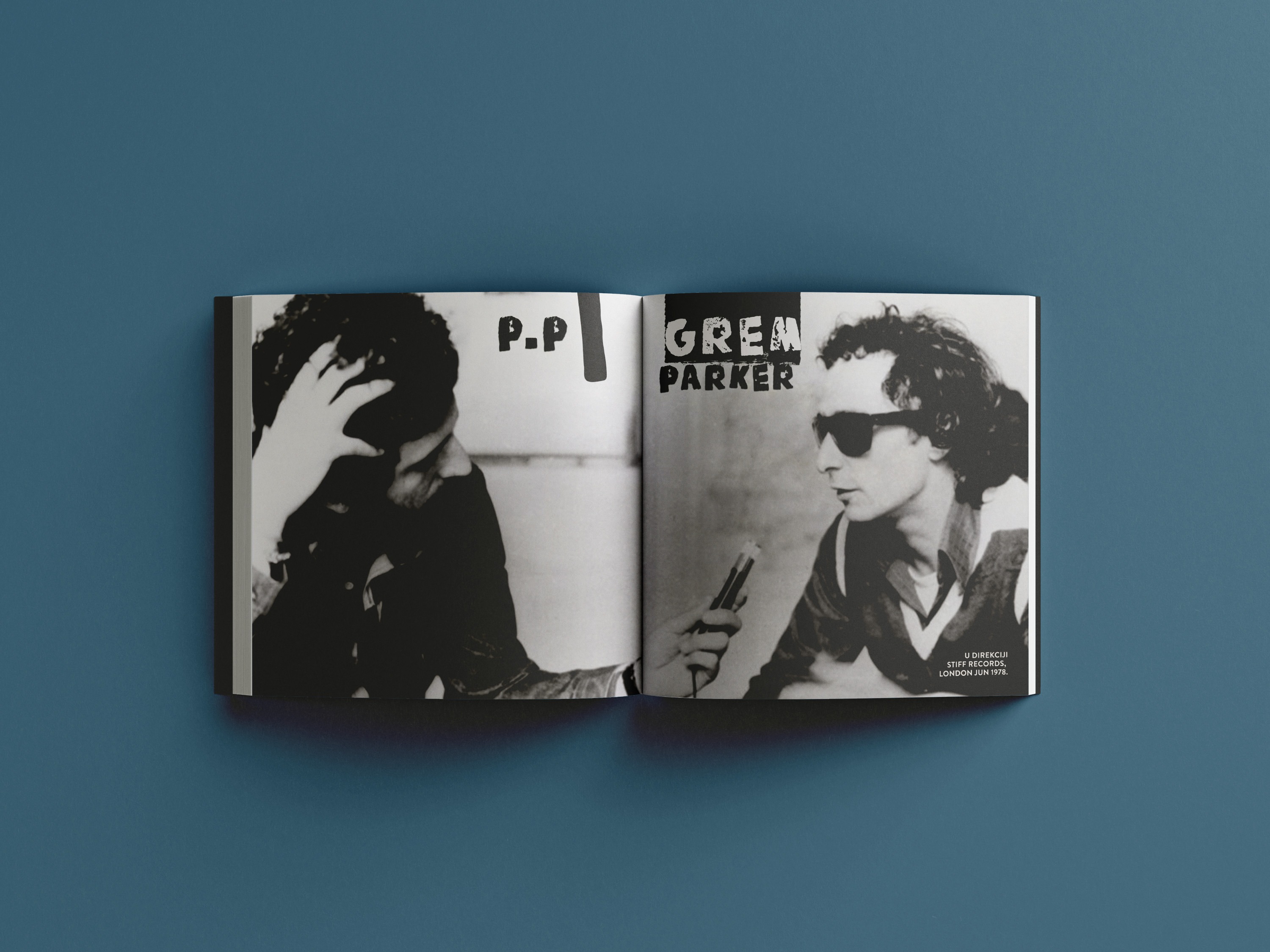 Full-bleed spread with high-contrast B&W portraits and punk stencil typography